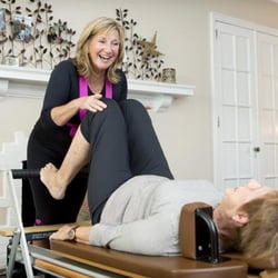 Vital Pilates - Suzie instructing Sue on the Pilates Reformer
