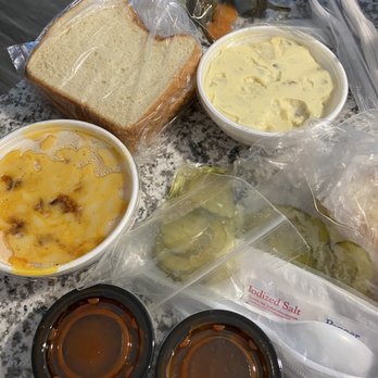 Black's BBQ - Potato Salad (best), Mac and Cheese, pickles, peppers, white bread, and BBQ Sauce - Barbeque Near Me - San Marcos, Texas