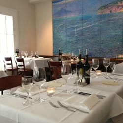 Amalfi - White table cloth, olive oil and vinegar.