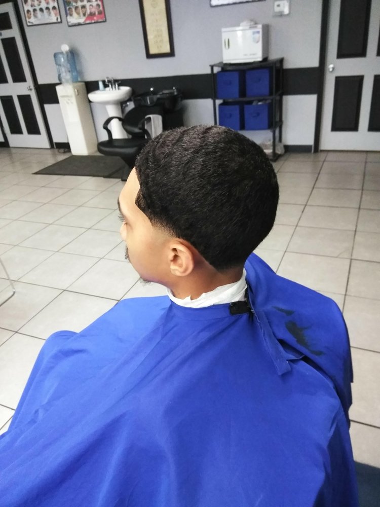 Woods Barbershop Logo