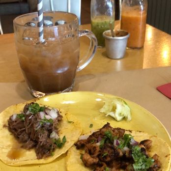 Taquerías Tamarindo - Tamarind agua fresca, House salsas, & tacos (barbacoa left, trompo right) - Mexican Near Me - Barcelona, B Taquerías Tamarindo - Tamarind agua fresca, House salsas, & tacos (barbacoa left, trompo right) - Mexican Near Me - Barcelona, B