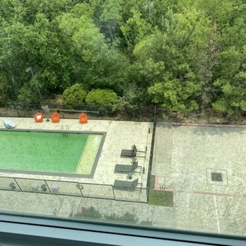 Aloft by Marriott Shenandoah Woodlands Area - View from room - exterior of windows (needs to be cleaned) - Hotels Near Me - Shenandoah, Texas Aloft by Marriott Shenandoah Woodlands Area - View from room - exterior of windows (needs to be cleaned) - Hotels Near Me - Shenandoah, Texas