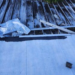 Duncan Roofing & Pressure Washing - What he put over our child's window. P.S. its still leaking!