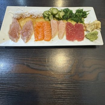 Sushi Teri - Samurai Sashimi (Right to Left): Tuna, Yellow Tail, Salmon and Albacore - Japanese Near Me - Goleta, California Sushi Teri - Samurai Sashimi (Right to Left): Tuna, Yellow Tail, Salmon and Albacore - Japanese Near Me - Goleta, California