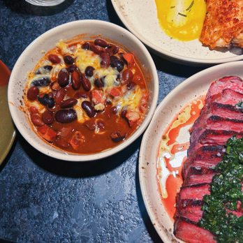 Little Coyote - Frijoles "De La Cola" (Ayacote Beans + Smoked Pork) * Smoked Beef Tri-tip Steak + Chimichurri - Mexican Near Me - Chattanooga, Tennessee Little Coyote - Frijoles "De La Cola" (Ayacote Beans + Smoked Pork) * Smoked Beef Tri-tip Steak + Chimichurri - Mexican Near Me - Chattanooga, Tennessee