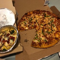 Domino's Pizza - Medium pizza with extra sauce onions and peppers. Pasta primavera .