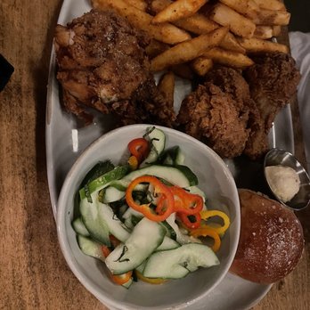 The Monroe - Fried chicken combo with a side of Fries and cucumber salad - New American Near Me - Orlando, Florida The Monroe - Fried chicken combo with a side of Fries and cucumber salad - New American Near Me - Orlando, Florida