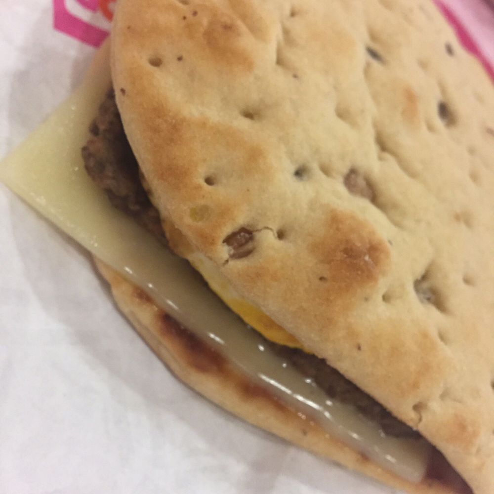 Dunkin' - Turkey sausage, egg and cheese flatbread. - Donuts Near Me - Peachtree Corners, Georgia Dunkin' - Turkey sausage, egg and cheese flatbread. - Donuts Near Me - Peachtree Corners, Georgia
