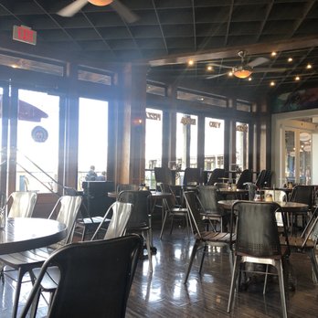 Pizza Oven - a restaurant with tables and chairs - Pizza Near Me - Kemah, Texas