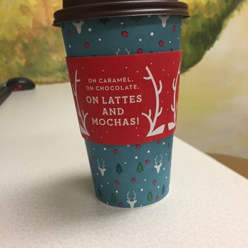Caribou Coffee - a cup of coffee on a table - Coffee & Tea Near Me - St. Paul, Minnesota Caribou Coffee - a cup of coffee on a table - Coffee & Tea Near Me - St. Paul, Minnesota