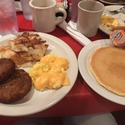 two plates of breakfast food