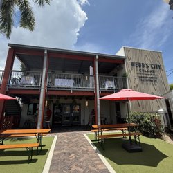 Front entrance. Small part of the outdoor seating. Event space outside upstairs.
