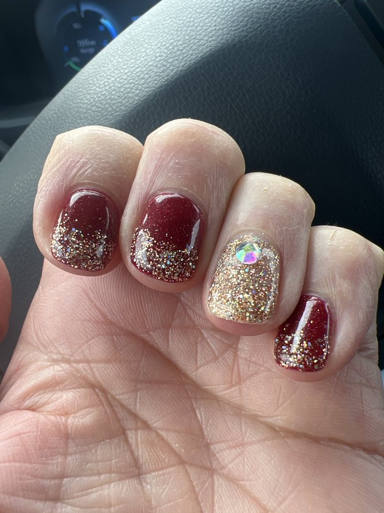 Oasis Nails & Day Spa Logo