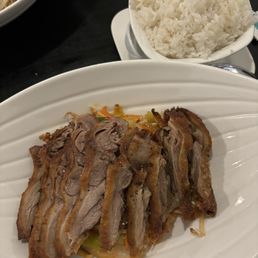Crispy duck with stir fried lemongrass and veggies. Crispy duck with stir fried lemongrass and veggies.