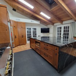 a kitchen with a large island a kitchen with a large island