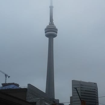 CN Tower - On a foggy day - Landmarks & Historical Buildings Near Me - Toronto, Ontario CN Tower - On a foggy day - Landmarks & Historical Buildings Near Me - Toronto, Ontario