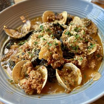 Main Street Kitchen & Bar - Spicy fennel sausage little neck clams and squid ink pasta - New American Near Me - Walnut Creek, California Main Street Kitchen & Bar - Spicy fennel sausage little neck clams and squid ink pasta - New American Near Me - Walnut Creek, California