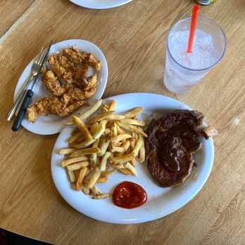Kelley's Country Cookin - My goddaughter's first meal--fried chicken strips (custom request) with fries, and steak. - American Near Me - Pasadena, Texas Kelley's Country Cookin - My goddaughter's first meal--fried chicken strips (custom request) with fries, and steak. - American Near Me - Pasadena, Texas