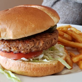 Bayfield Inn - Deluxe Burger, brioche bun ($15+$3 for Beyond Burger). Fine. Pretzel bun is better. - Hotels Near Me - Bayfield, Wisconsin