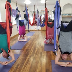 Asian Rejuvenation Wellness - Enjoy our trapeze yoga class. Bring 5 people for a group class and get a free class for yourself!