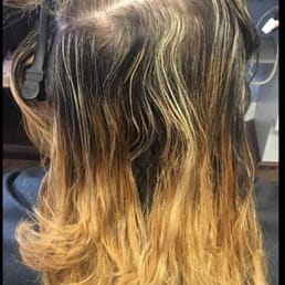 This is what the stylist at this salon did to my hair . It's disgusting to me that they could do this