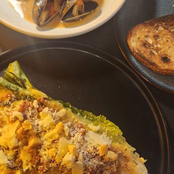 Ngogo - Caesar salad and mussels - French Near Me - Toronto, Ontario