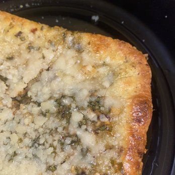 Dewz Restaurant - Hair in focaccia garlic bread that's stuck because of the melted cheese on top. - New American Near Me - Modesto, California