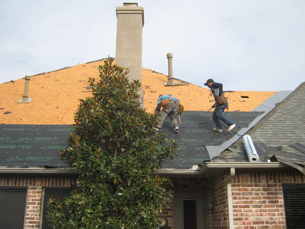 Slide of Norwood Roofing Systems