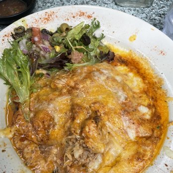 Old Town Mexican Cafe - Mexican lasagna. 50% cheese, with a surprise side of olives. - Mexican Near Me - Key West, Florida