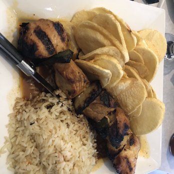 Sagres Restaurant - Grilled kebab chicken with rice & Sagres' own homemade potato chip wedges - Portuguese Near Me - Fall River, Massachusetts