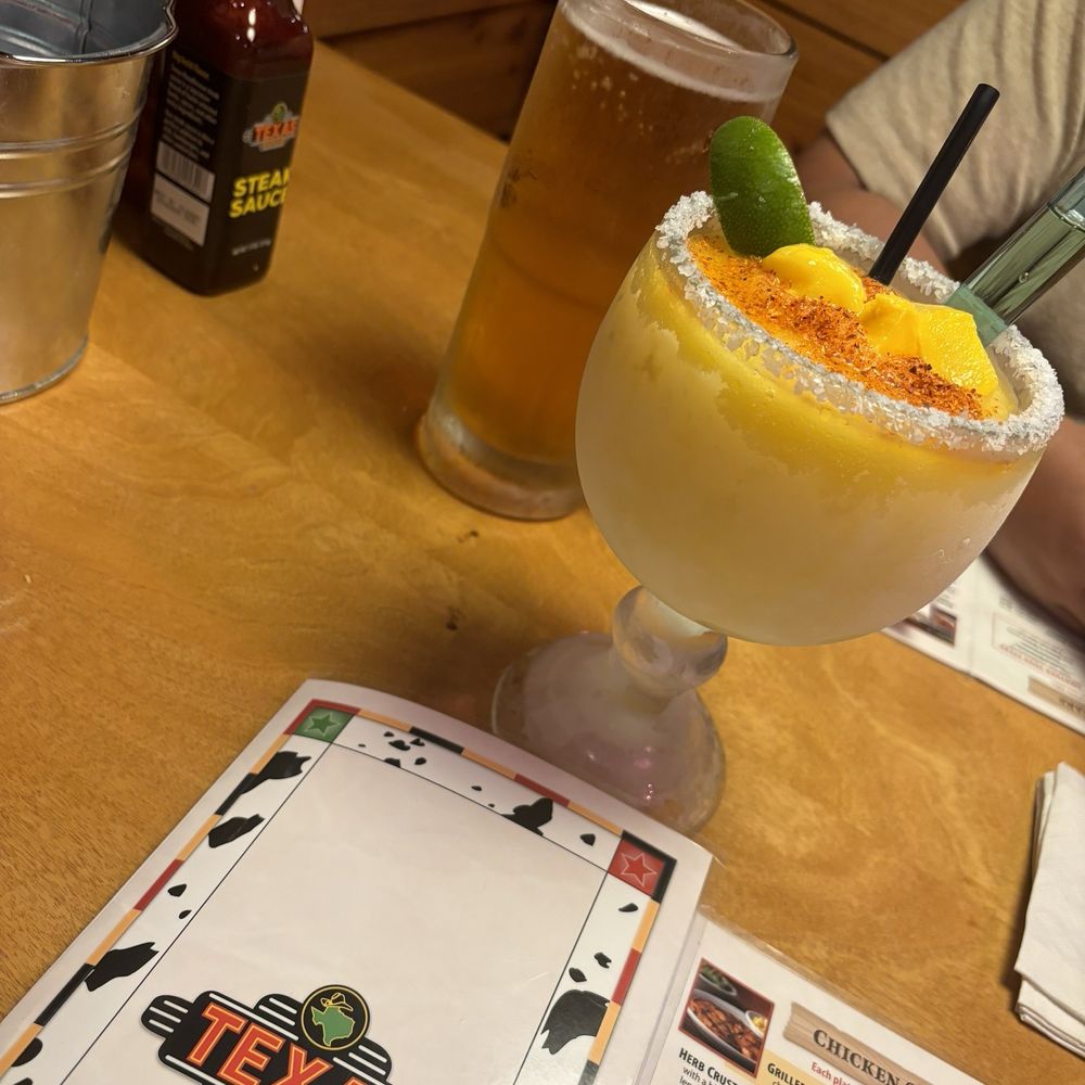 Texas Roadhouse - Mango margarita with 1800 and a modelo beer - American Near Me - Mt. Prospect, Illinois Texas Roadhouse - Mango margarita with 1800 and a modelo beer - American Near Me - Mt. Prospect, Illinois