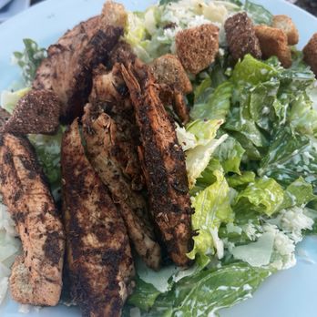 Sun Dog Cafe - Caesar salad with jerk chicken - Caribbean Near Me - Cruz Bay, Virgin Islands Sun Dog Cafe - Caesar salad with jerk chicken - Caribbean Near Me - Cruz Bay, Virgin Islands