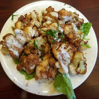 Garlic Crush - Spiced fried cauliflower with tahini - Mediterranean Near Me - Bellevue, Washington