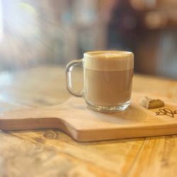 Ella Cafe - Cappuccino served with some sunlight
