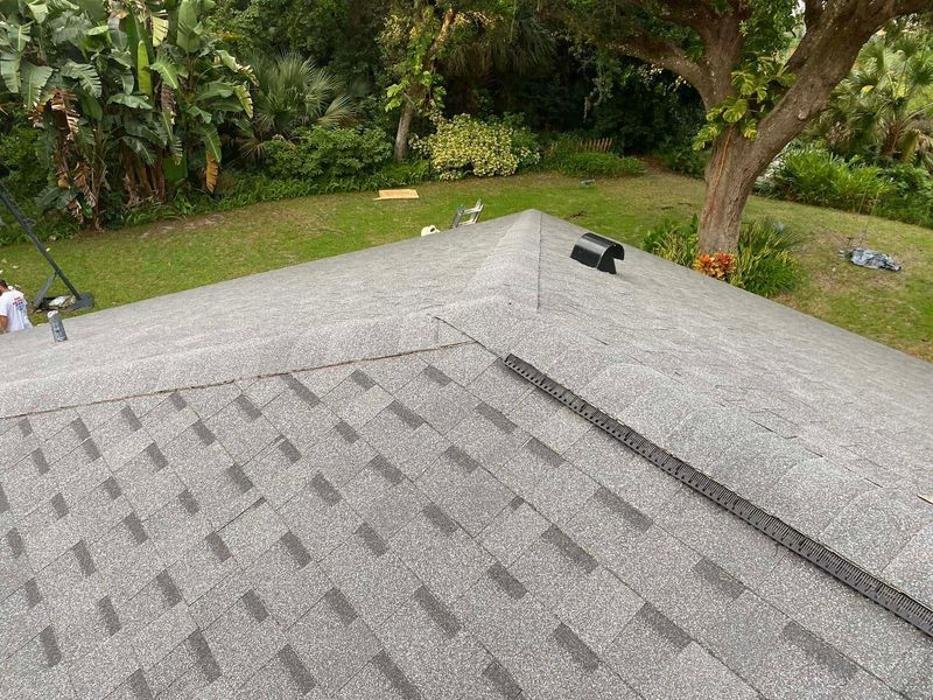 Slide of All American Roofing & Exteriors