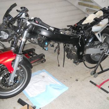 Busted Knuckle Garage - Engine removed from a Triumph to repair starter clutch. - Motorcycle Repair Near Me