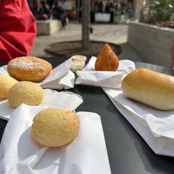 Pingo de Mel Brazilian Bakery - LR: Cheese bread, donut, chicken croquette, cheese sausage bread