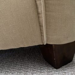 Two Men and a Truck - Des Moines - Broken leg on sofa