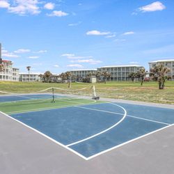 Pelican Condominiums & Beachhouse - Pickle Ball/Basketball sport court.