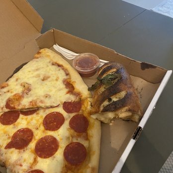 Due Amici Pizza & Pasta Bar - Half a Stromboli anyone ? - Pizza Near Me - Tampa, Florida