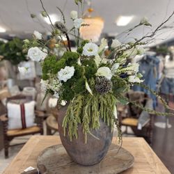 Olives and Home Downtown - Elegant floral arrangement and artisan décor inside Olives & Home Downtown.