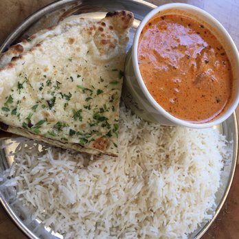 ADYA - Garlic naan with rice and chicken tikka masala - Indian Near Me - Anaheim, California ADYA - Garlic naan with rice and chicken tikka masala - Indian Near Me - Anaheim, California