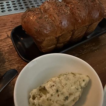 Lindens - Freshly baked loaf with herb butter - New American Near Me - New York, New York