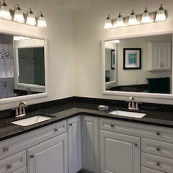 USA Plumbing - a bathroom with two sinks and mirrors - Plumbing Near Me - Myrtle Beach, South Carolina USA Plumbing - a bathroom with two sinks and mirrors - Plumbing Near Me - Myrtle Beach, South Carolina