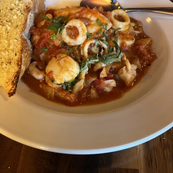 The Villa Restaurant - Seafood stew which came with a side of white rice and garlic bread - Italian Near Me - Wayland, Massachusetts The Villa Restaurant - Seafood stew which came with a side of white rice and garlic bread - Italian Near Me - Wayland, Massachusetts