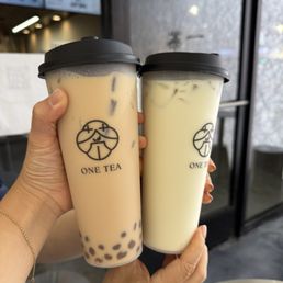 Left: one tea signature blend w/ house milk and golden boba (less boba) Right: camellia royale w/ house milk Left: one tea signature blend w/ house milk and golden boba (less boba) Right: camellia royale w/ house milk