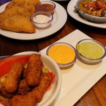 Bahama Breeze - Jamaican jerk wings skillet jerk shrimp empanadas - Bars Near Me - Woodbridge, New Jersey Bahama Breeze - Jamaican jerk wings skillet jerk shrimp empanadas - Bars Near Me - Woodbridge, New Jersey
