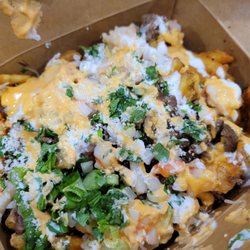 Randizzle's Food Truck - So much yummy fries packed inside this box including carne asada and shrimp!