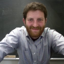 ATX Test Prep - An ATX Test Prep instructor in his natural environment. In front of a chalkboard.