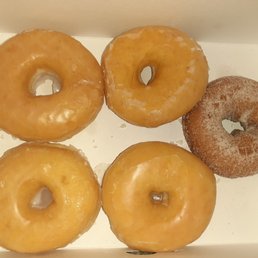 six glazed donuts in a box